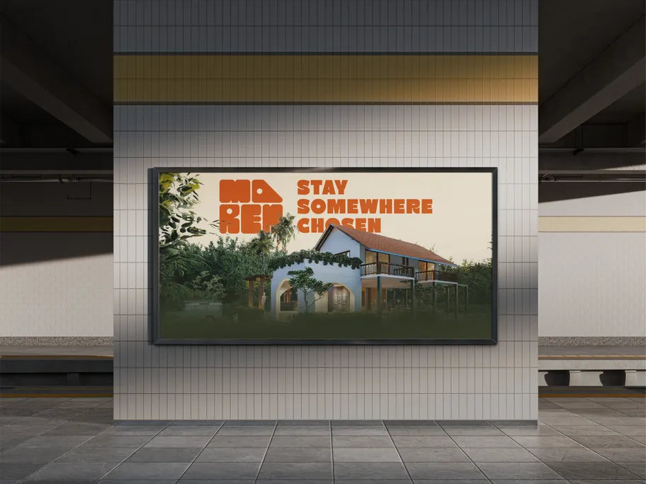 A Maren billboard on a tiled station wall